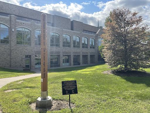 The Peace Pole sits outside the Lavery Library. (Photo by Madison Weber)