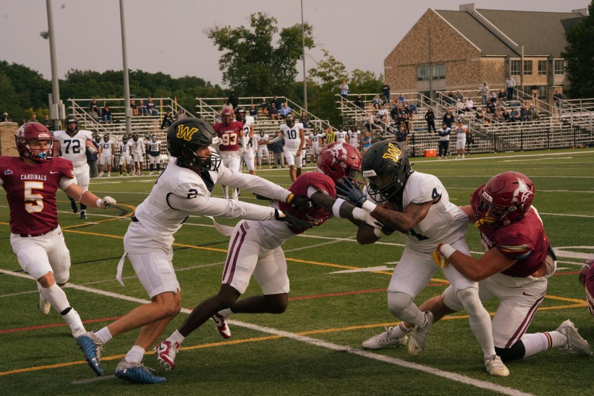 Fisher makes the tackle (Photo taken by Nicole Pomerleau @frames_by_nicole)