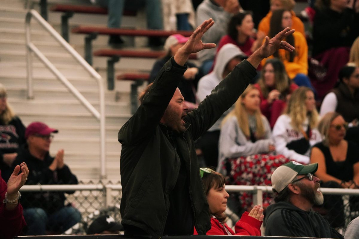 Fisher fan celebrating (Photo taken by Nicole Pomerleau @frames_by_nicole)