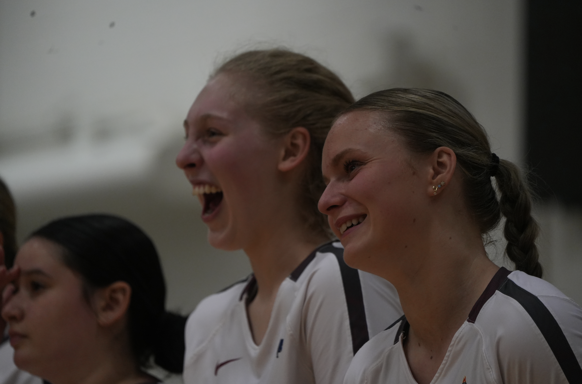Isabella Maher (right) and Ana Gutman cheer for the team (Photo taken by Nicole Pomerleau @frames_by_nicole)