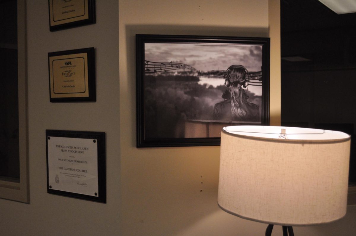 (Above) Decorations in the lounge, including framed awards for the Cardinal Courier.