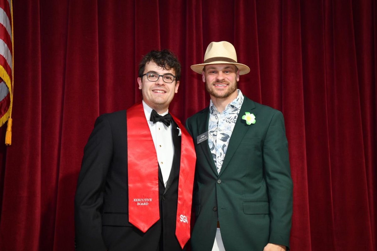 Vincenzo Perfetti, SGA's current Vice President, poses with Chris Keyes, director of Student Engagement and Leadership, at the Cardinal Awards on April 8.